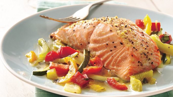 high protein salmon on a bed of vegetables