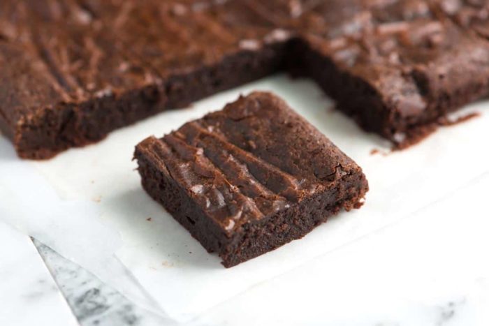 a healthy brownie cut from the rest of the batch 